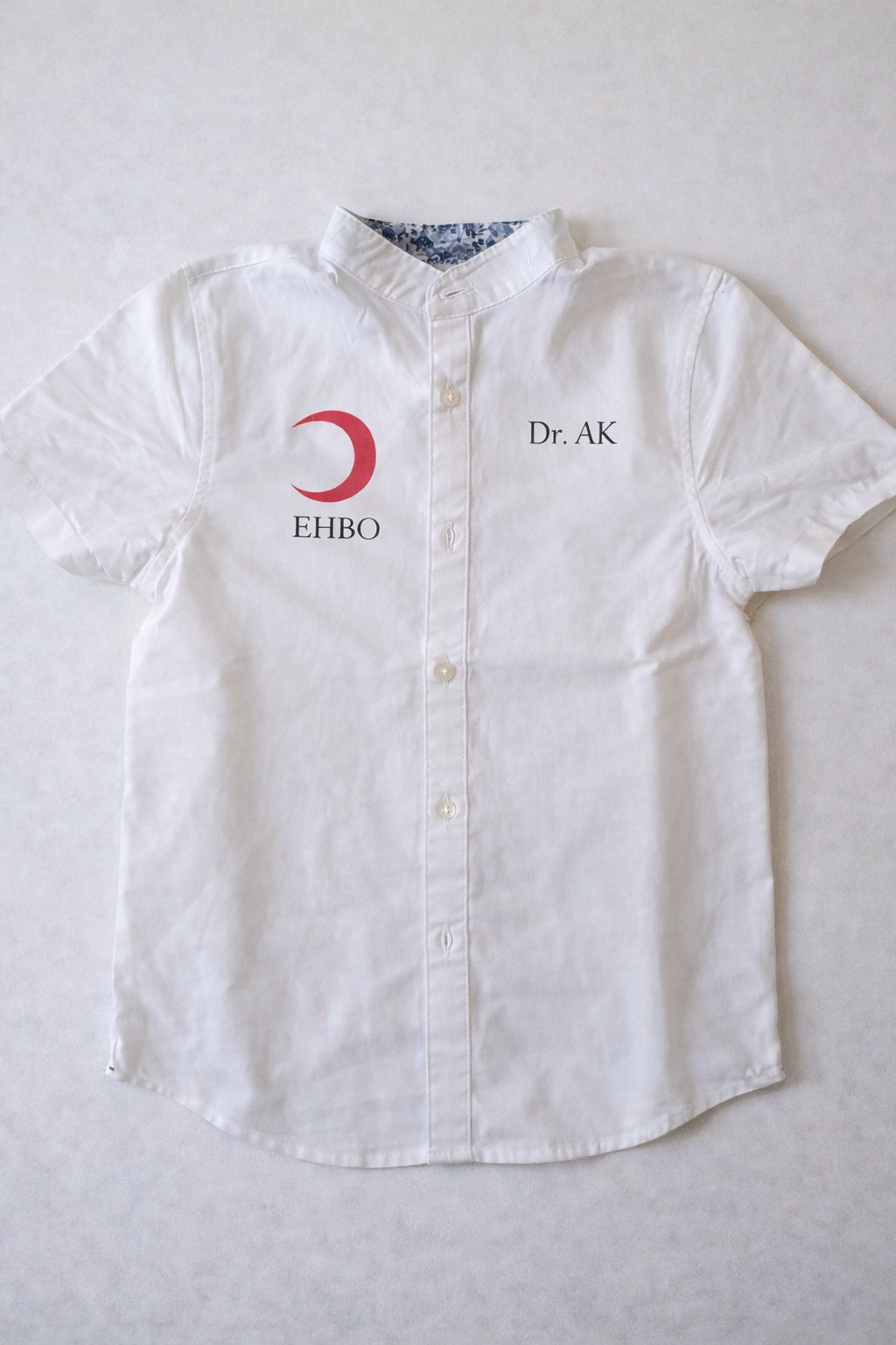 T-shirt rode maan/kruis